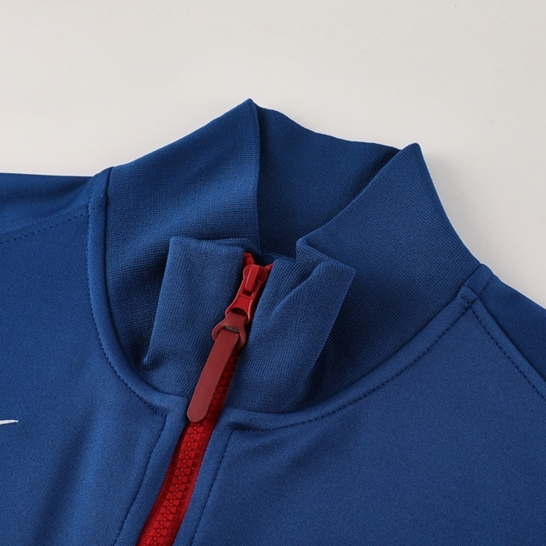 Tenue d'entraînement PSG 25/26 (veste + pantalon) bleu marine et rouge